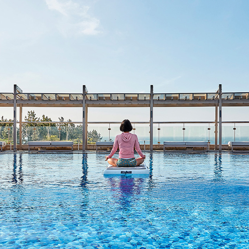 Start your morning with Floating Pilates in the Adult Pool under the morning sun, followed by a relaxing break on a daybed.
